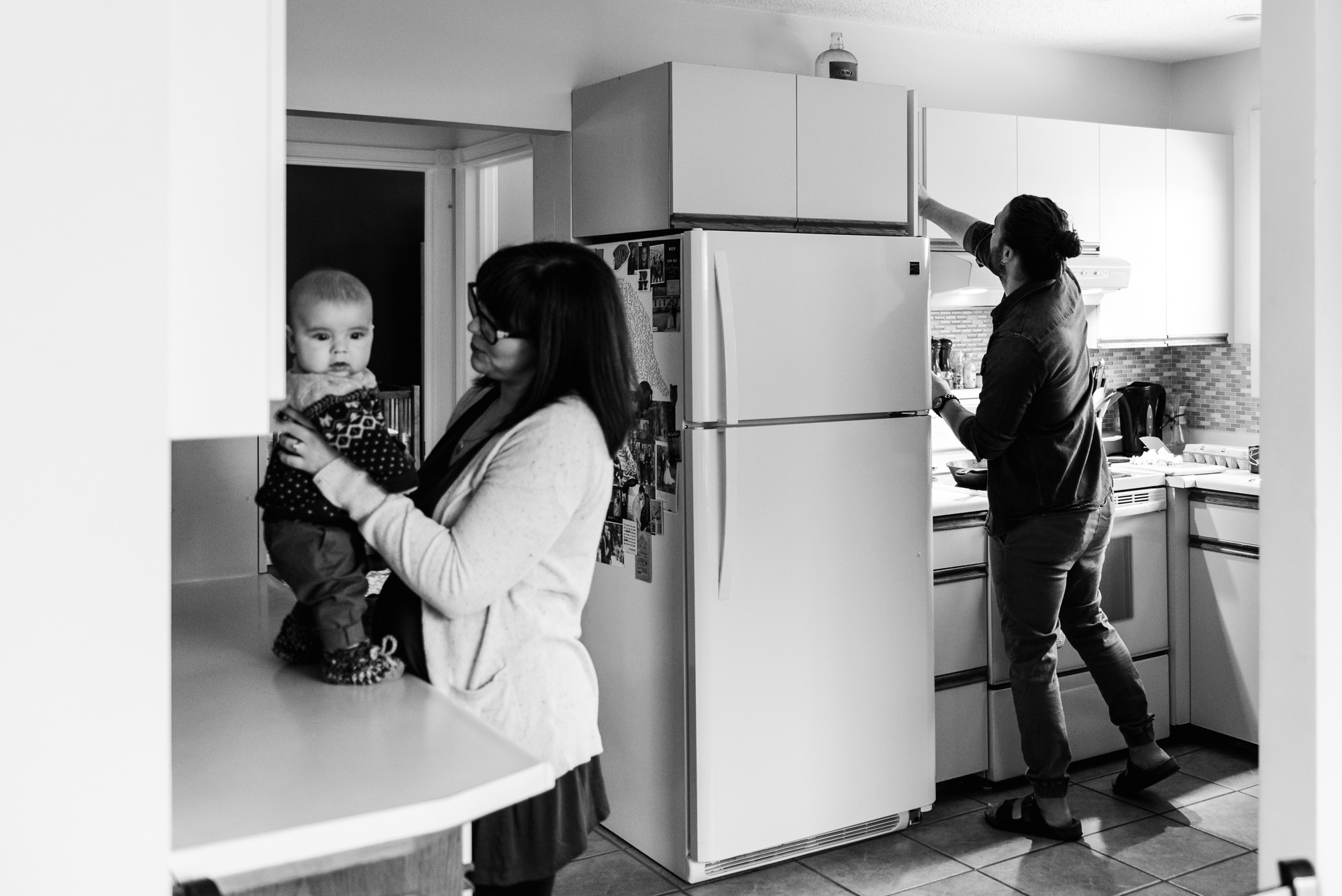 A family spends a weekend morning together cooking breakfast in their Fort Saskatchewan home.