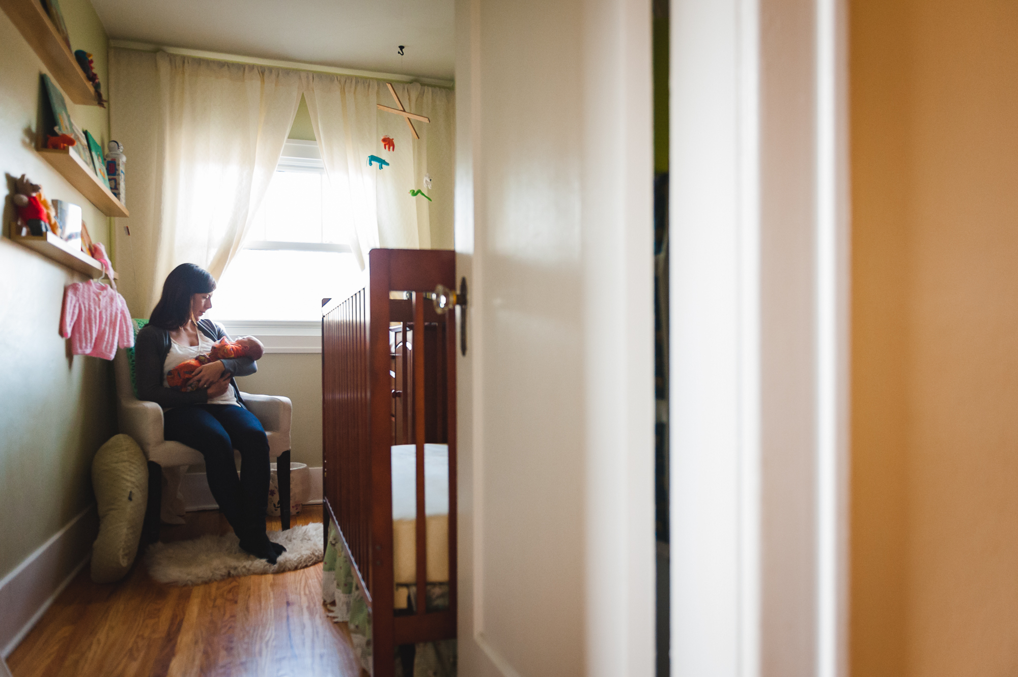 Making a tiny nursery work for newborn photos. In-home family and newborn photographer Edmonton.