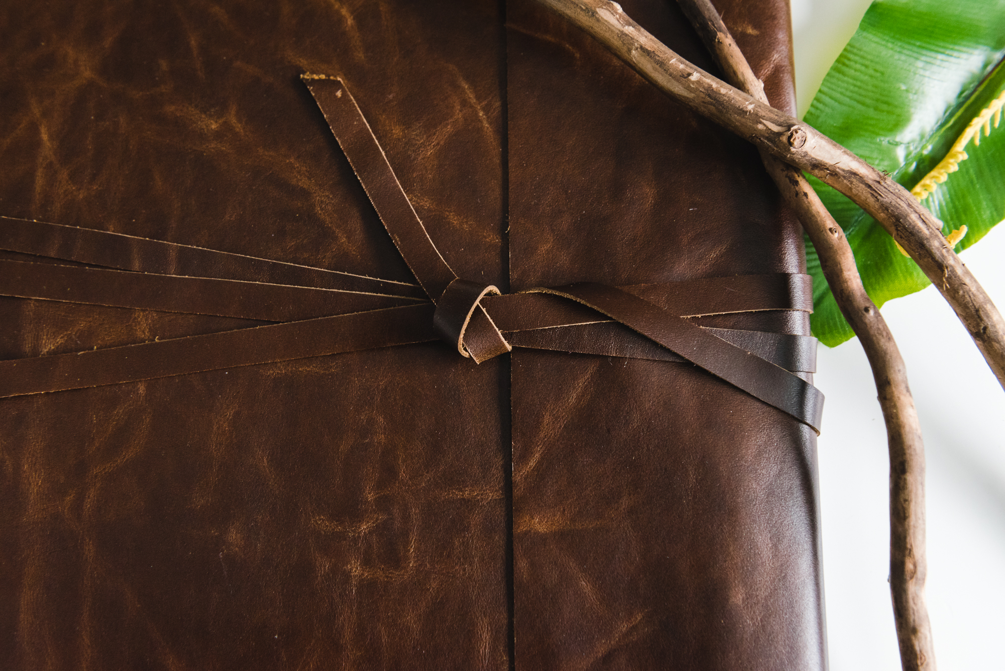 Modern and unique leather tie album. Family photos Edmonton.