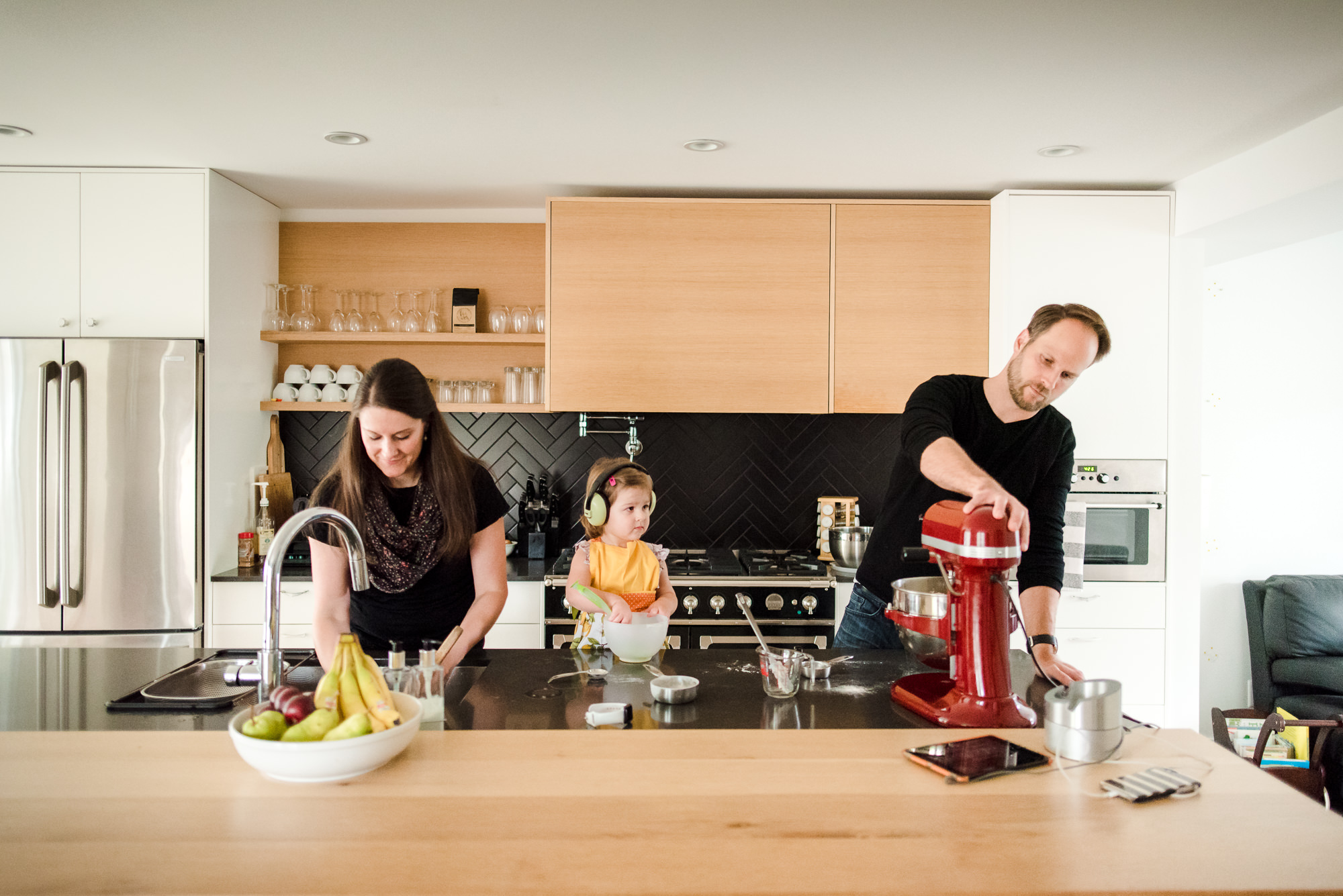 A family bakes in their Edmonton kitchen. 