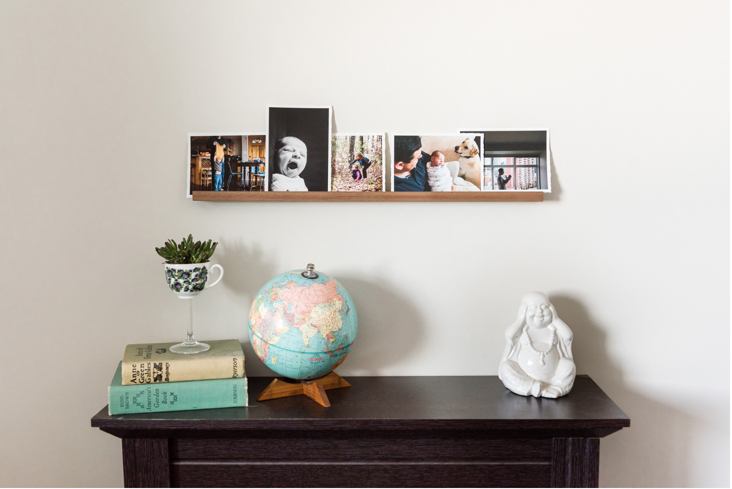 A wooden photo ledge made in Edmonton available through Fiddle Leaf Photography