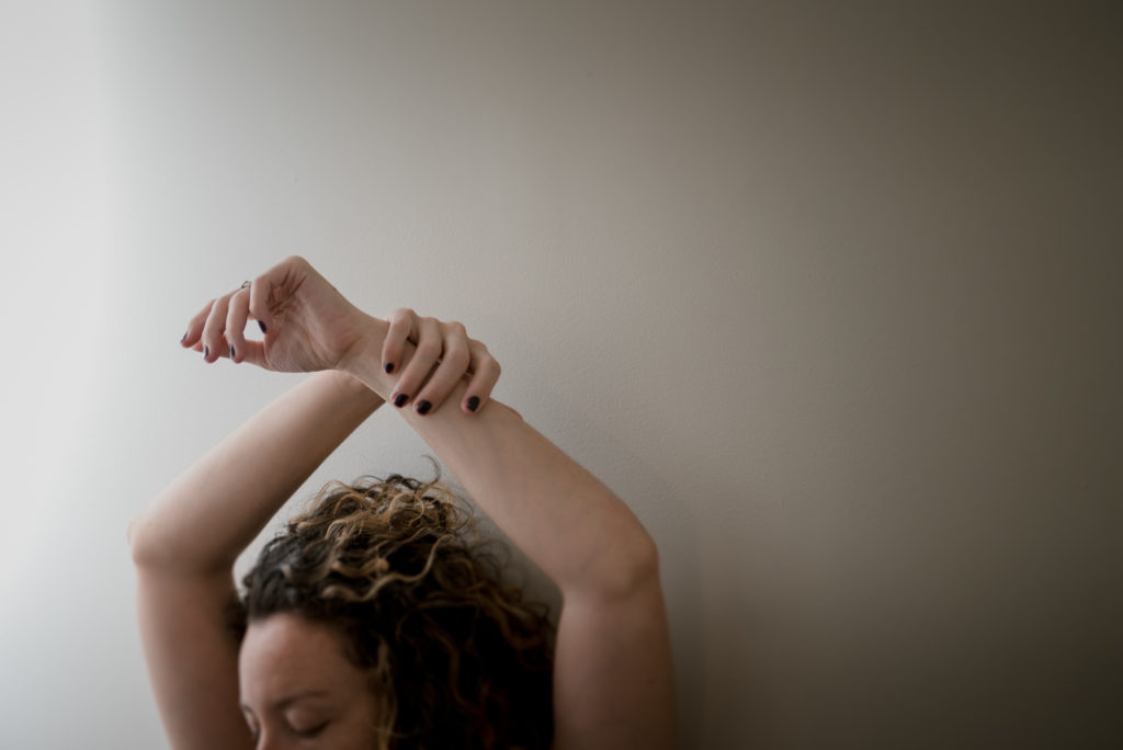 a self portrait of a woman's hands