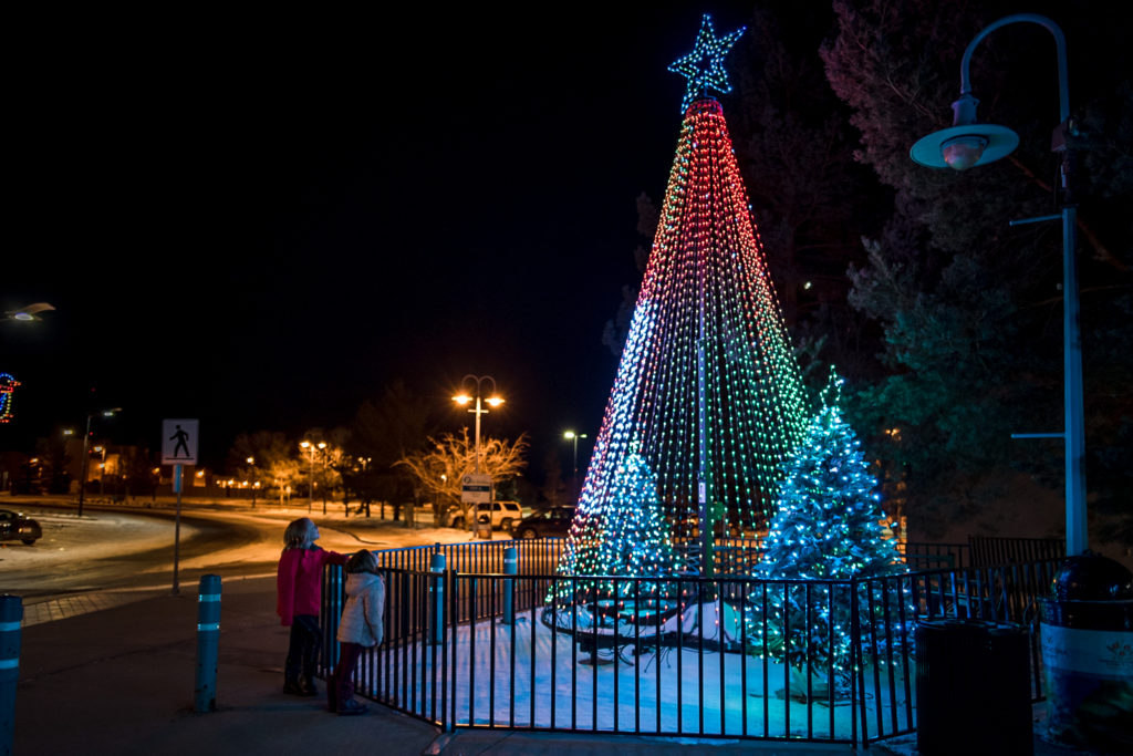 2 girls look at the holiday lights in Strathcona County sherwood park, ALberta